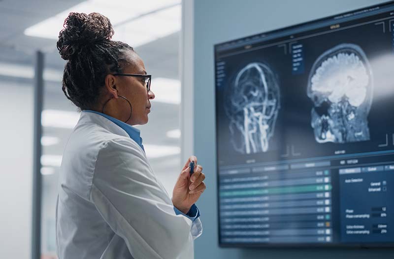 Doctor looking at scans Doctor looking at scans