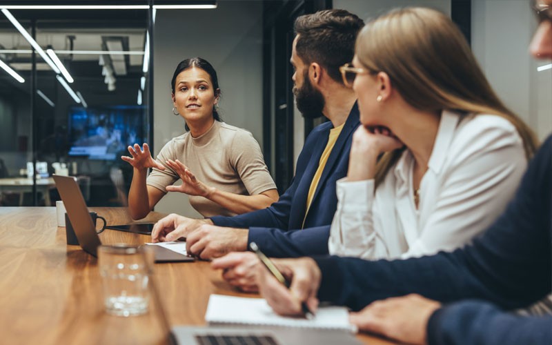 Our goal is to help you make the best buying decisions for your company Group of business professionals evaluate and assess buying decisions