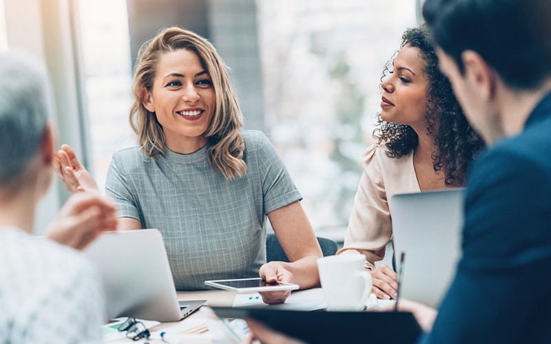 Better equipped than ever to create meaningful connections Group of business professionals strategizing with devices