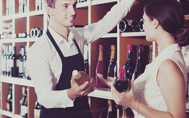 TCO winner – Wine Warehouse Two person talking about wine