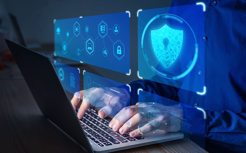 CipherTrust Data Security Platform Person typing using a laptop