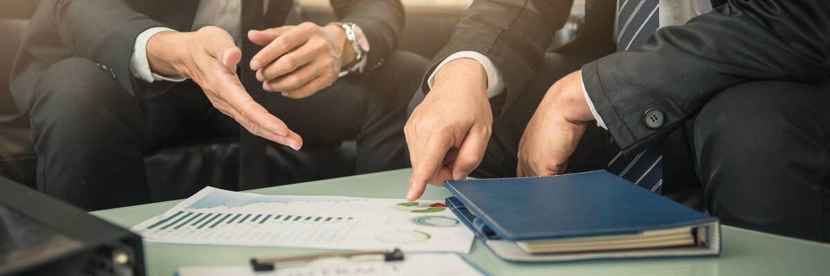 How to survive a publisher software audit Male users going over anayltics