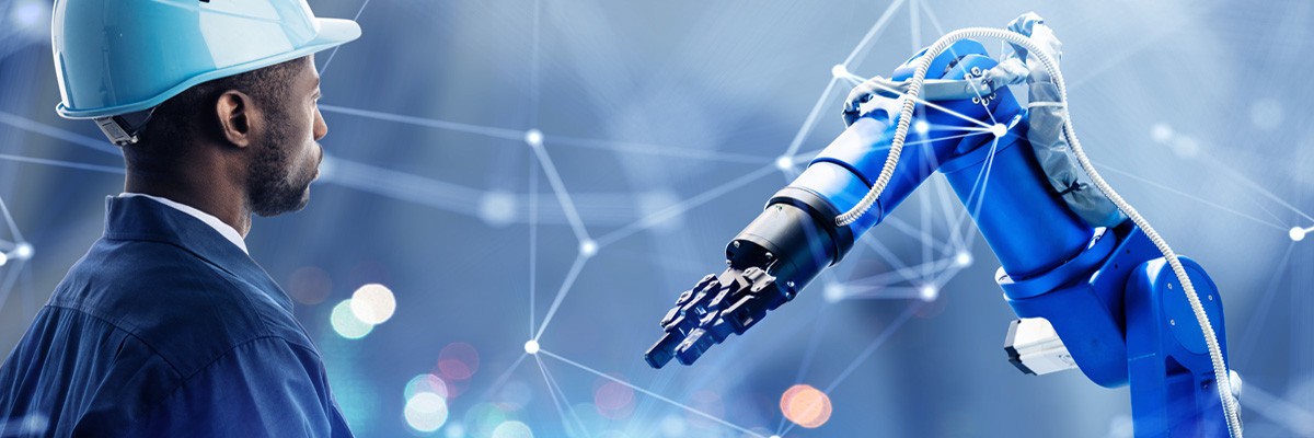 Improving Worker Safety Through Industrial IoT Abstract concept of smart manufacturing, man in front of tool