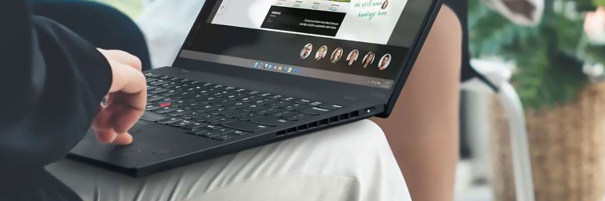 Prepare for Long-Term Workplace Protection With ThinkShield Businessman using Lenovo ThinkShield laptop computer