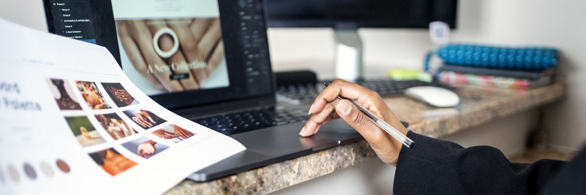 Guide to AI Design Tools for Creative Professionals Close up view of graphic designer using AI tools