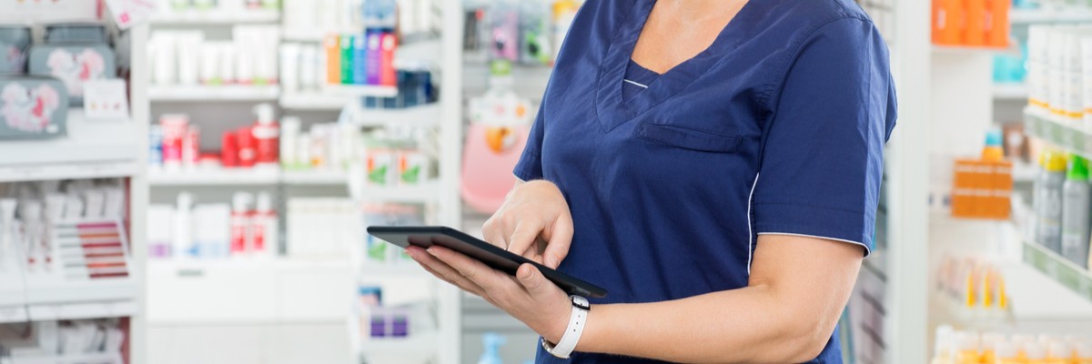 Automation and Internet of Things Transform Pharmacies Photo of a nurse that is using a tablet in the medication room