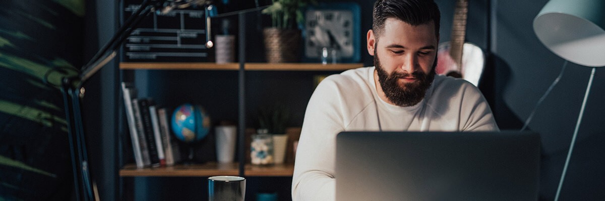 From Intranet to Digital Work Hub: Transforming Employee Experience in the 21st Century User on laptop at home working