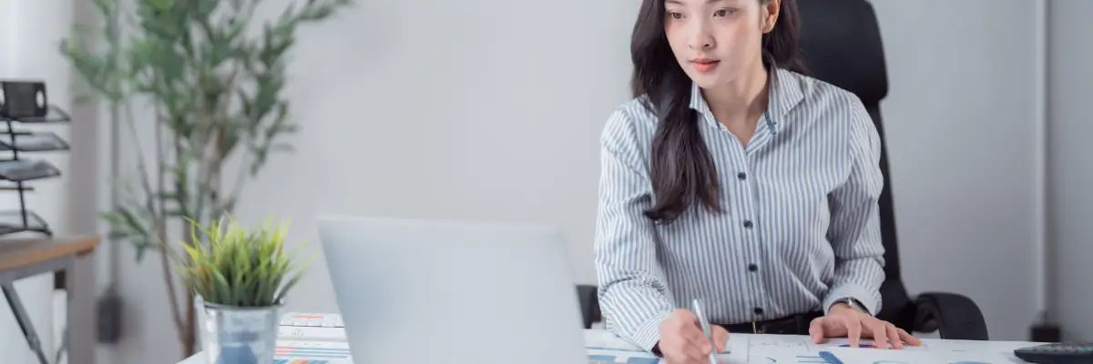 GitHub is Moving to Usage-Based Billing: Here’s What You Need to Know Girl working on a laptop