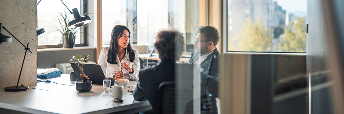 Why mergers & acquisitions (M&As), divestitures and separations have become part of nearly every enterprise’s DNA Team in office meeting