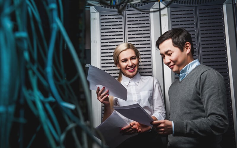 Are Your Technology Decisions Killing Your Customer Experience Business employees in server room