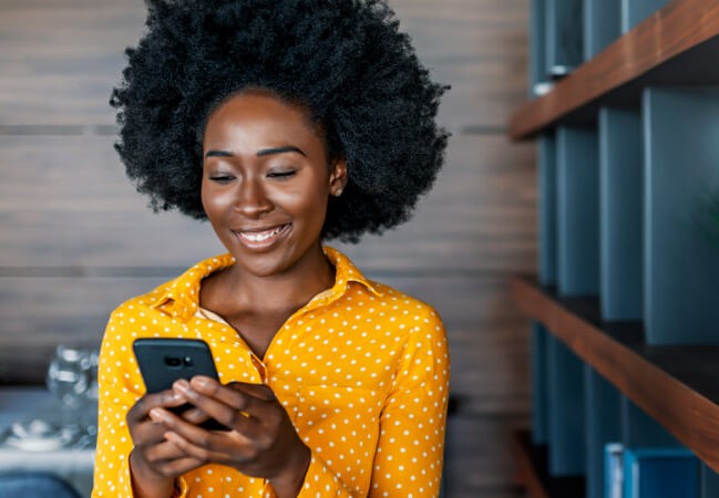 Understand the use cases for mobile devices in the retail setting Customer using smart phone in store