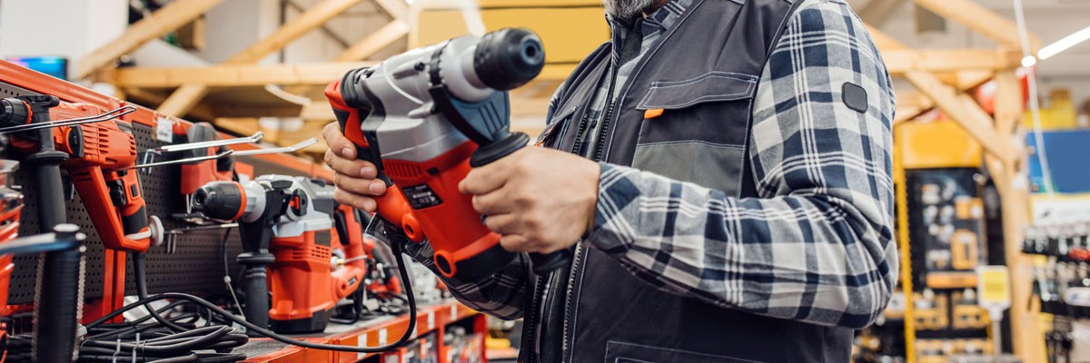 Thanks to Insight's work, the client now has a self-service platform buildout Woman on tablet device in retail store environment