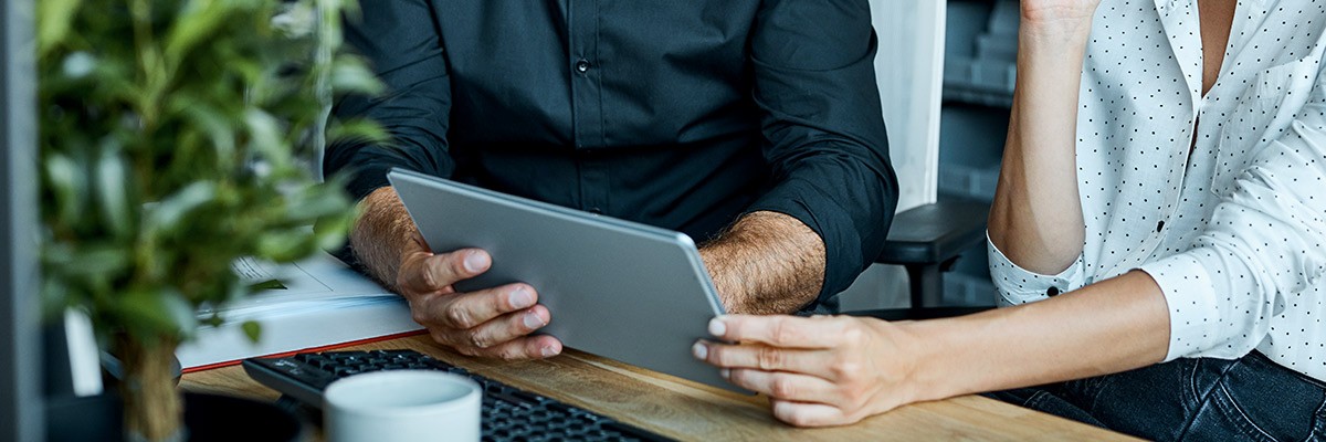 Users using tablet device at work