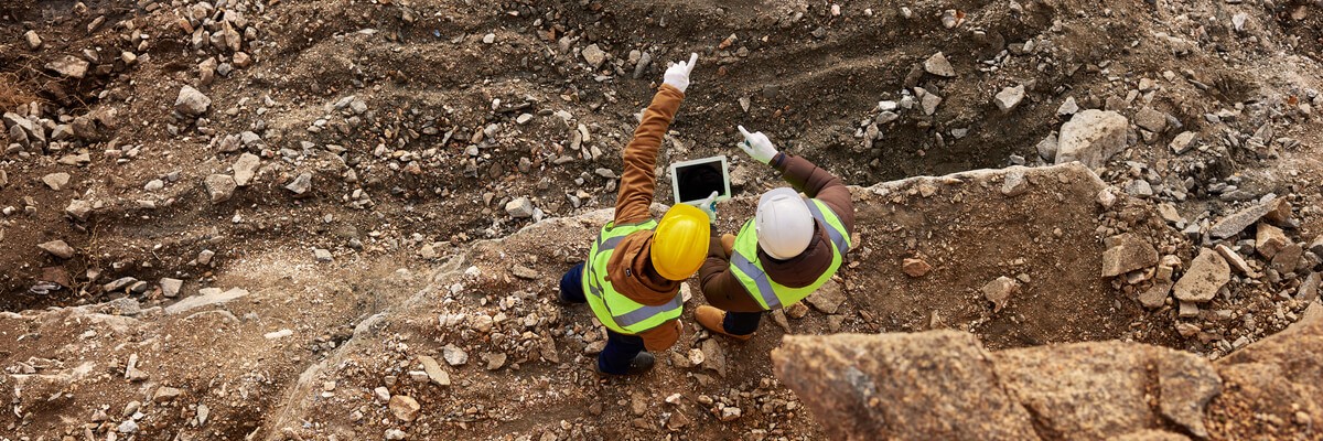 Facilitating a Move to Azure Mining men working on tablet device