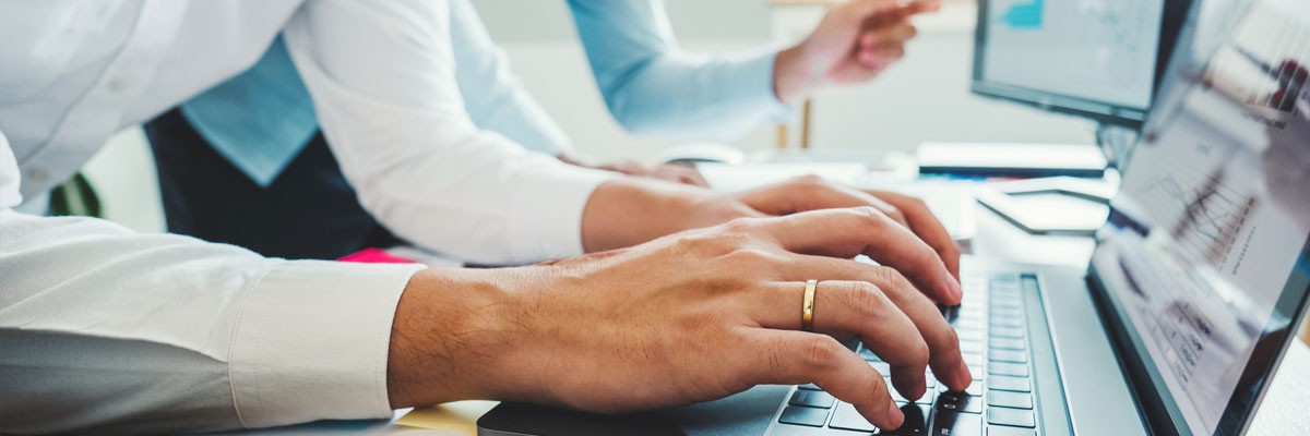 Global Nonprofit Research Institute Addresses Cloud Security Gaps Close up of nonprofit workers analyzing data