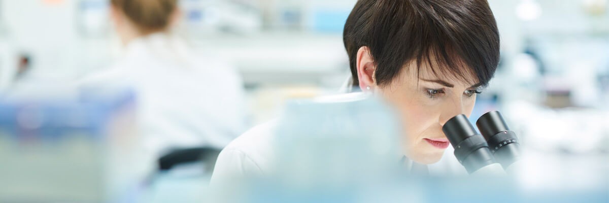 Procure, maintain and replace the technology to run your business Pharmaceutical rep looking through magnifying glass