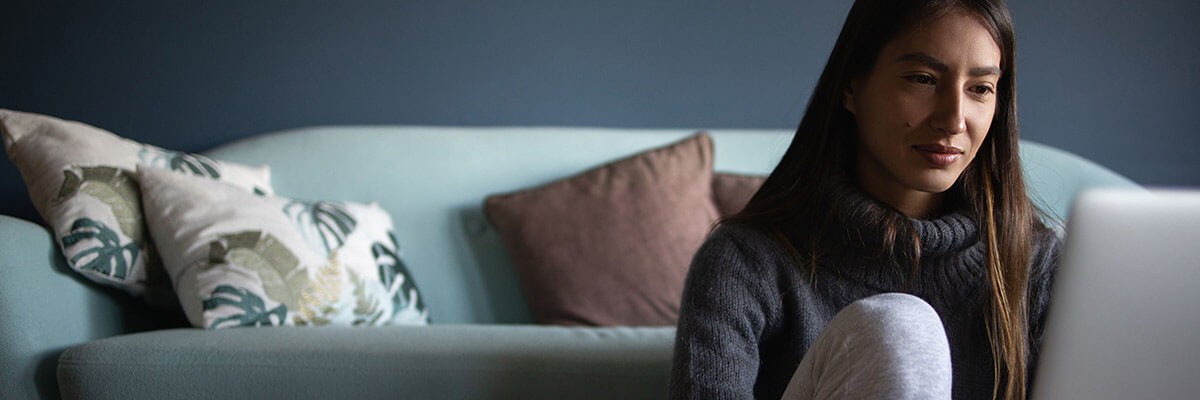 How Westerra Prioritized Digital Transformation in the Face of Disruption Woman working from home on laptop