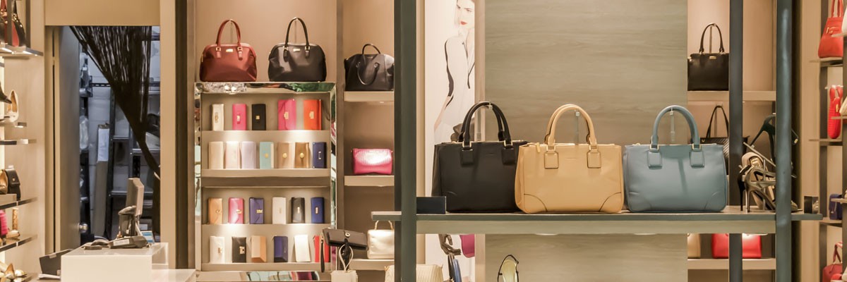 Improving Luxury Retail Training With Process Documentation Close up of store shelves with purses