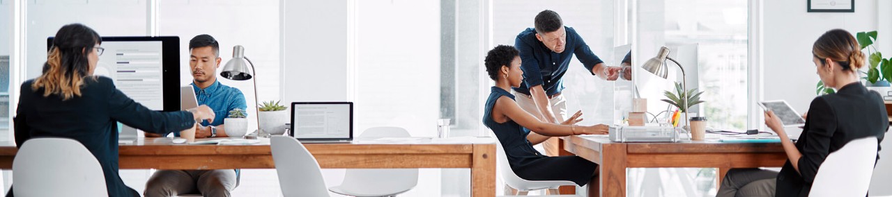 Insight’s Connected Workforce and IT teams collaborated to design a solution that met our current goals and future needs Business team works in modern workplace on multiple Apple iPad and Mac devices.