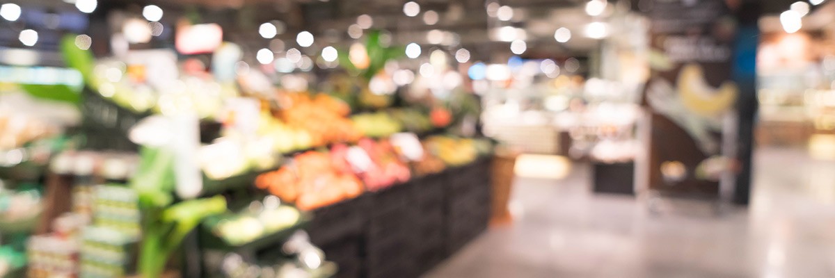 Grocery store customer experience with technology Blur image of grocery store