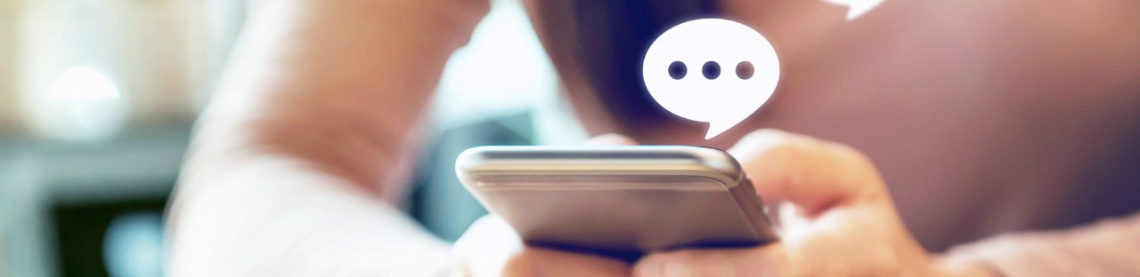 Make every customer interaction meaningful, memorable and efficient every day Fingers typing message on smart phone