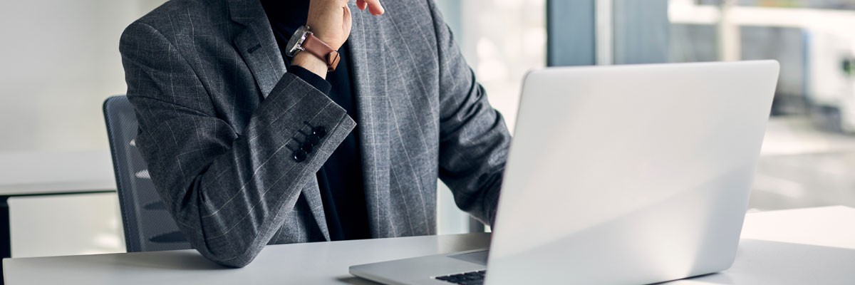 Powering a Nation: Federal Agency Modernizes IT to Focus on the Future Federal government employee uses laptop computer in open office