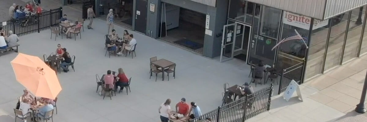Ignite owners wanted to do more to help build a safe space for people to regain sense of normalcy and connection. Customers sitting outside and enjoying their meal safely. Back to business Thermal monitoring Thermal camera Bolide advanced IoT platform Connected Platform