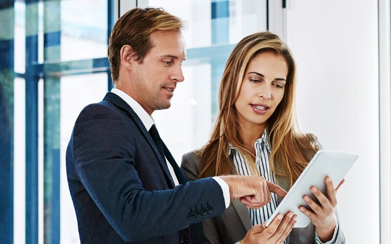 Find out how a data warehousing infrastructure will benefit your business IT professional working on computer in data center