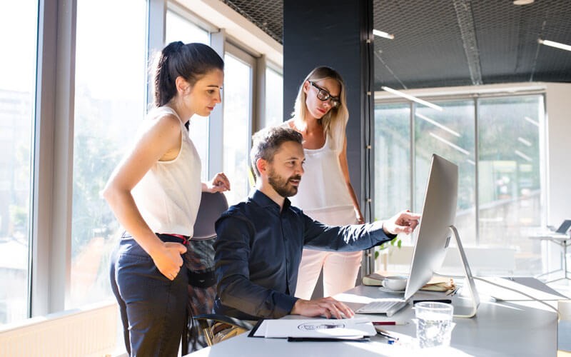 Data driven approaches to help your organization improve profitability Team collaborating