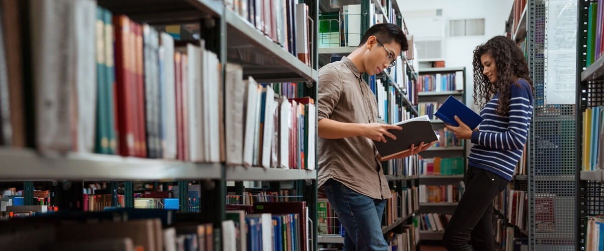 4 ways to prepare for back to school 2020 Students reading books in a library