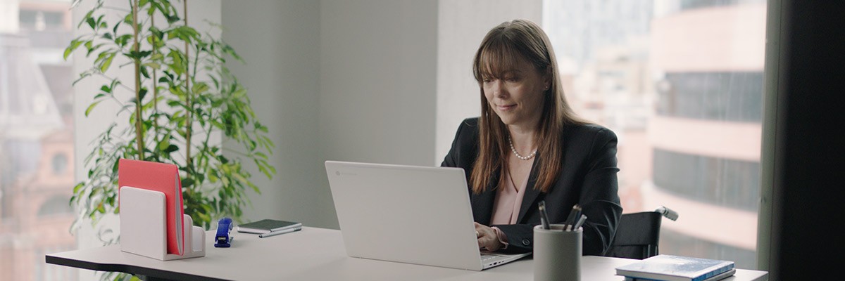 Secure and Optimize your Contact Center with Chrome OS Woman working using Google laptop