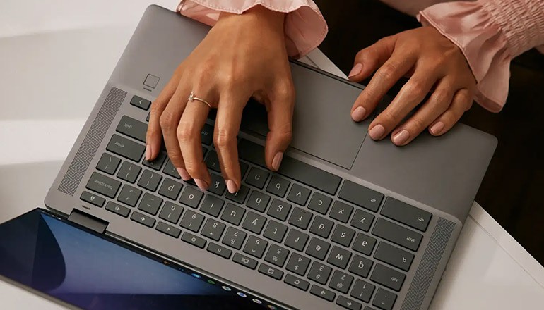 Corporate Resiliency with Insight & ChromeOS Upcoming Webinar ChromeOS device with user typing on keys