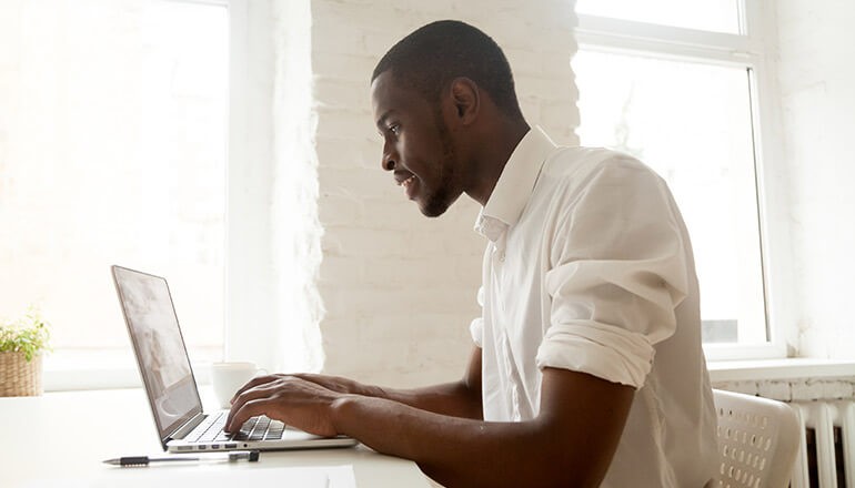 Strategies for creating and managing virtual learning programs for a large remote workforce. Business professional watching SAP webinar. Enable Now webinar, Virtual learning, Enterprise Resource Planning, ERP training, How do you train a remote workforce?