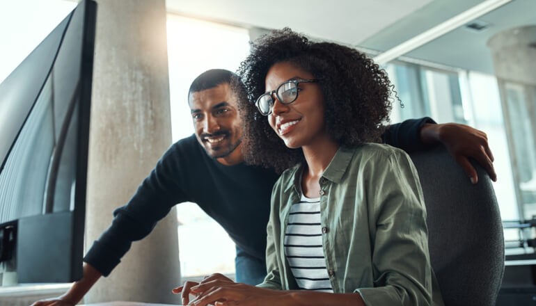 NVIDIA Omniverse Enterprise: Maximize productivity with real-time collaboration webinar Woman and man working together on laptop