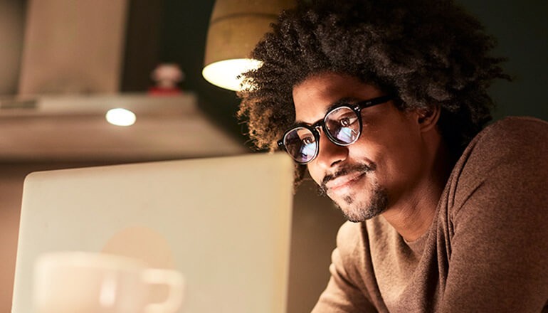 Our virtual training experts will share best practices for virtual learning, leading and collaboration. Business professional on virtual call with team. Best practices for working from home webinar.