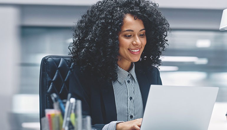 . Insight and Microsoft provide you with robust support in achieving crucial IT and business goals Businesswoman using Windows 11 on laptop device