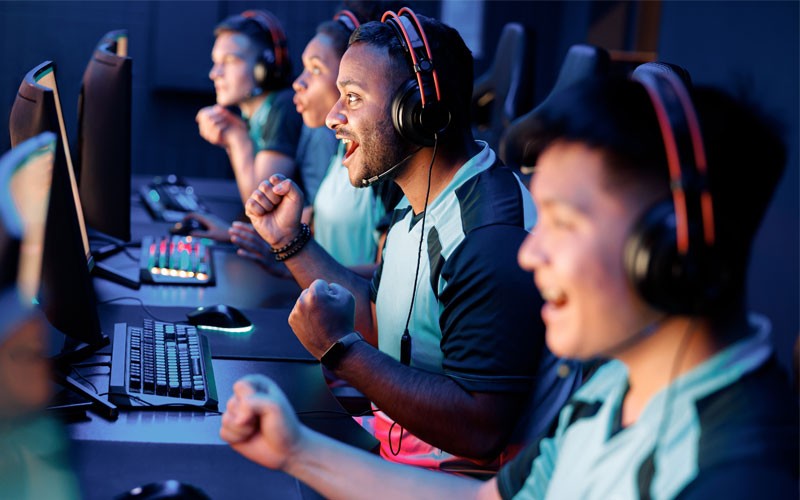 Apply skills learned in the classroom to real-life scenarios College students participate in esports gaming competition