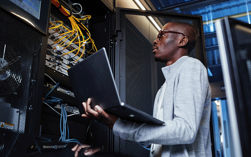 man-working-at-datacenter man-working-at-datacenter