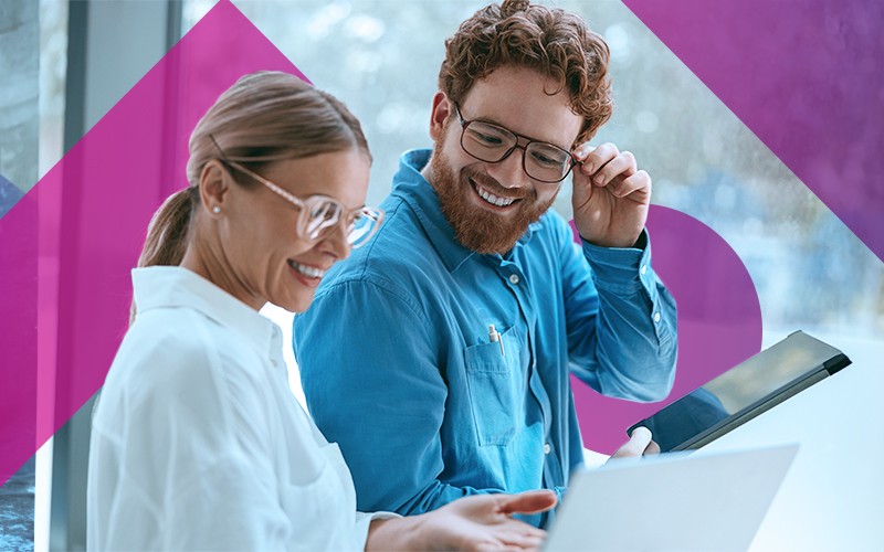 Peace of mind two workers looking at prints