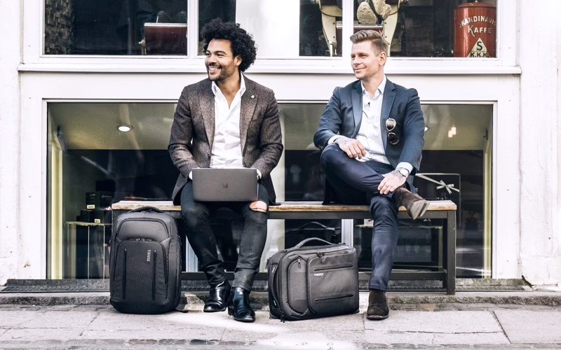 Making your employees feel welcome from day one is the most important part of onboarding Professionals sitting on a chair