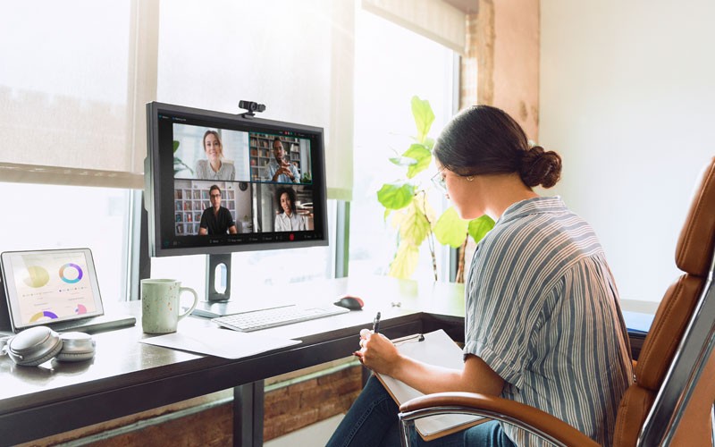 cisco-woman-working-from-home-virtual-meeting cisco-woman-working-from-home-virtual-meeting