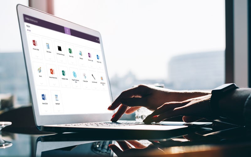 Citrix Workspace User typing on laptop with Citrix Workspace displayed