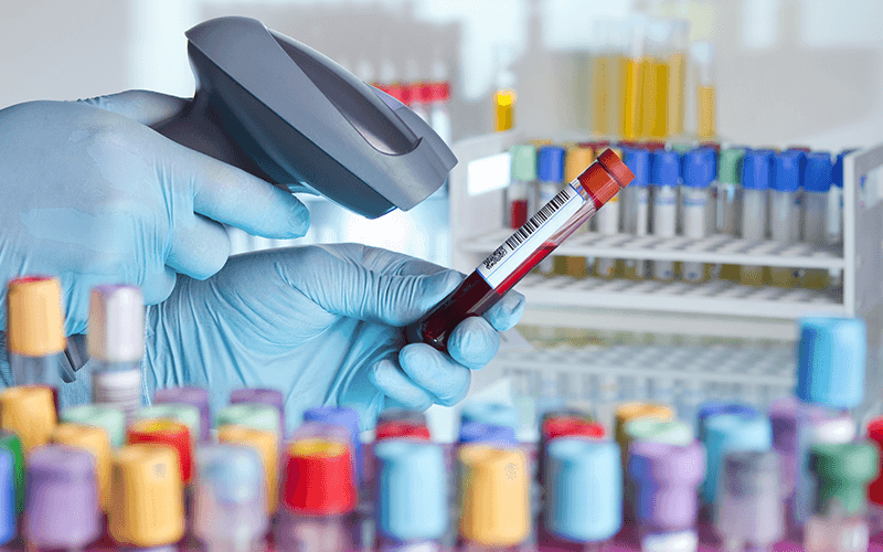 Why Insight and Datalogic? Person using Datalogic bar code scanner