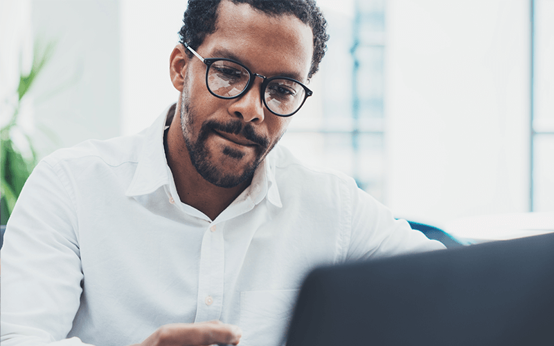 World-class support Man working using a laptop