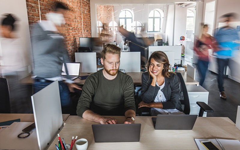 Entrust nShield Hardware Security Module (HSM) solutions simplify encryption Two colleagues talking to each other