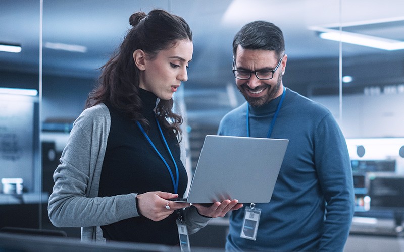 Industry-leading switches and routers from Extreme Networks have powerful scalability and flexibility features. Teammates working together at the office