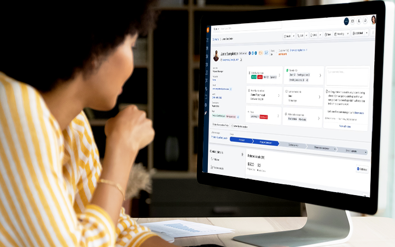 Freshsales® and Freshmarketer® make it possible to deliver consistent experiences by consolidating customer Woman using desktop