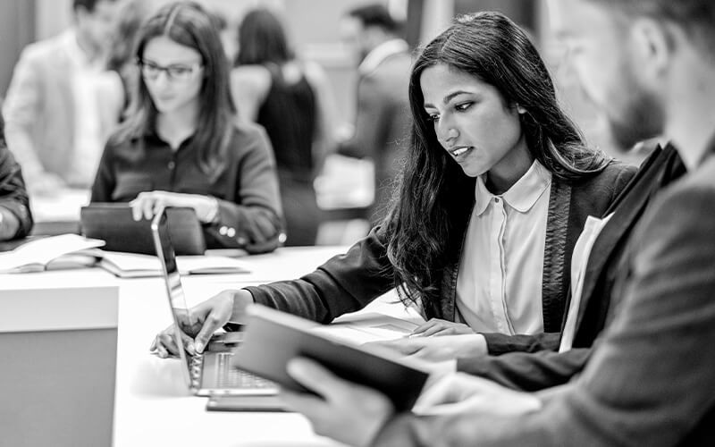 Grammarly for Education Colleagues talking to each other