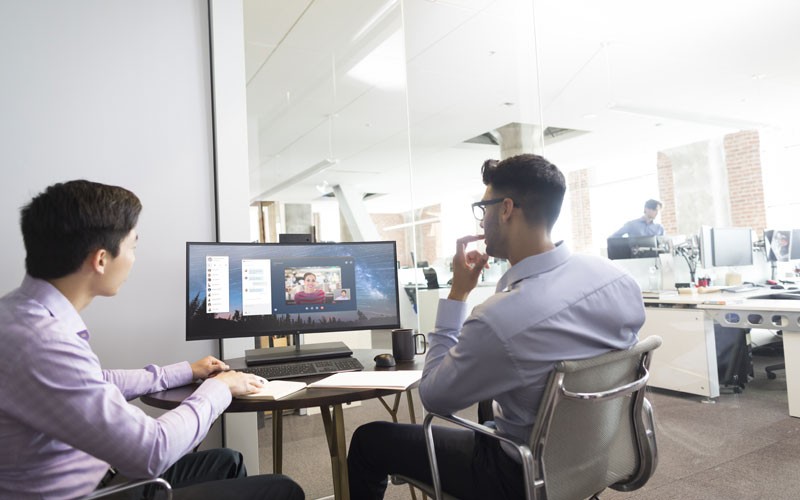 Insight and HP deliver tailored solutions for education, healthcare and government Two men working on HP devices