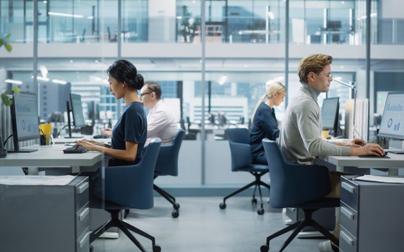 Get the most from your cloud investment. View of business professionals in open office environment